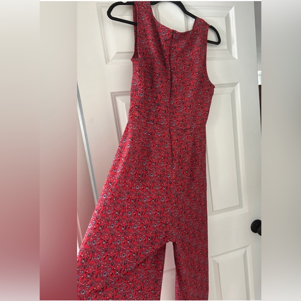 Floral V neck drapped surplice sleeveless cropped jumpsuit with full rear zipper